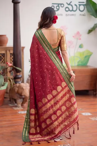 Maroon premium soft silk blend designer saree with zari motifs & rich border