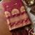 Maroon premium soft silk blend designer saree with zari motifs & rich border