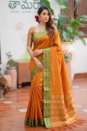 Yellow premium soft silk blend designer saree with zari motifs & rich border
