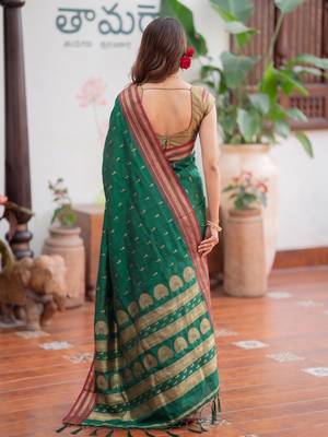 Green premium soft silk blend designer saree with zari motifs & rich border 3