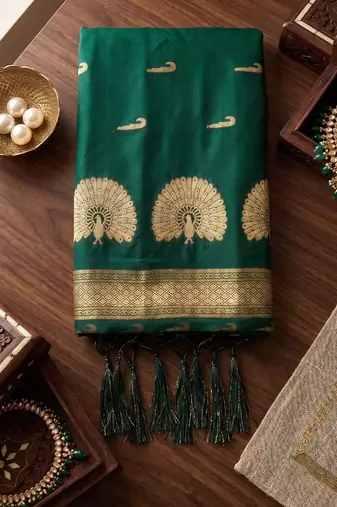 Green premium soft silk blend designer saree with zari motifs & rich border