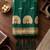 Green premium soft silk blend designer saree with zari motifs & rich border