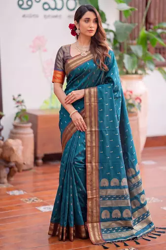 Blue premium soft silk blend designer saree with zari motifs & rich border