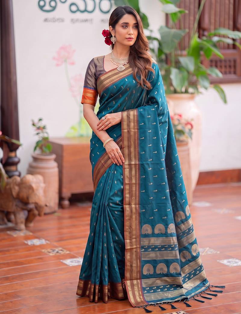 Blue premium soft silk blend designer saree with zari motifs & rich border