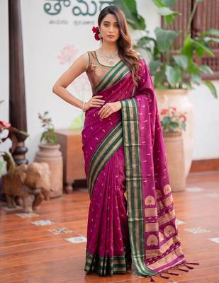 Pink premium soft silk blend designer saree with zari motifs & rich border 1