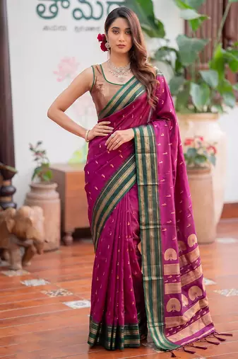 Pink premium soft silk blend designer saree with zari motifs & rich border