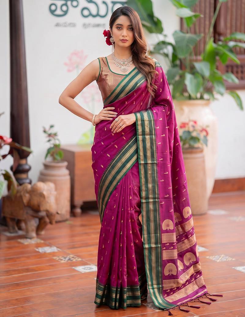Pink premium soft silk blend designer saree with zari motifs & rich border