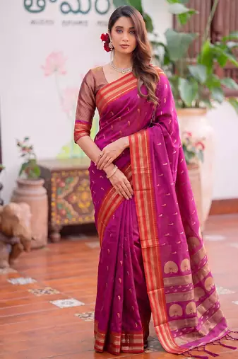 Light pink premium soft silk blend designer saree with zari motifs & rich border