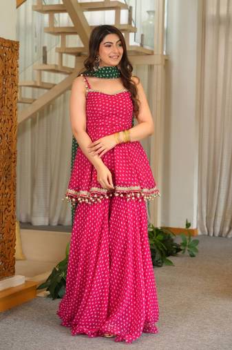 rani pink color heavy bandhej print with fancy lace and hanging latkan work kediya palazzo set