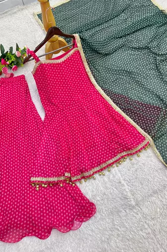 rani pink color heavy bandhej print with fancy lace and hanging latkan work kediya palazzo set