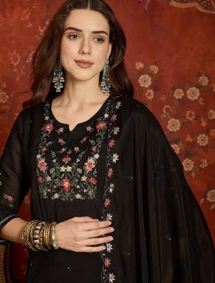 Black cotton embroidered kurta set. 1