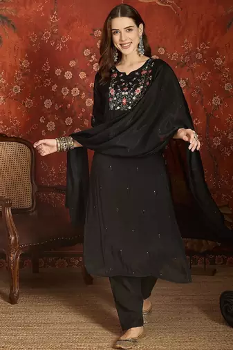 Black cotton embroidered kurta set.