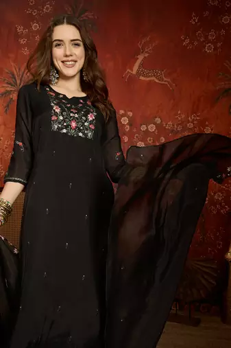 Black cotton embroidered kurta set.