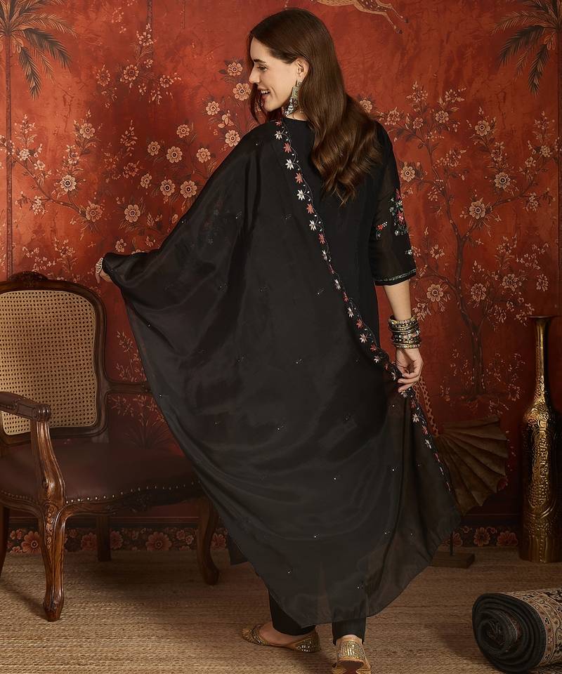 Black cotton embroidered kurta set.