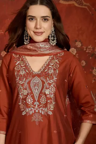 Rust cotton embroidered kurta set.