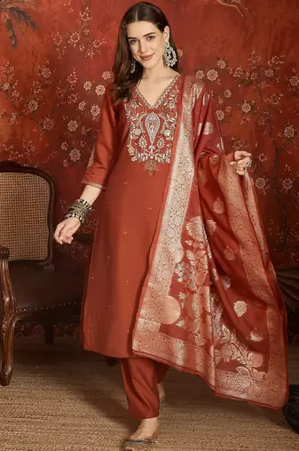Rust cotton embroidered kurta set.