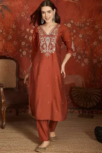 Rust cotton embroidered kurta set.