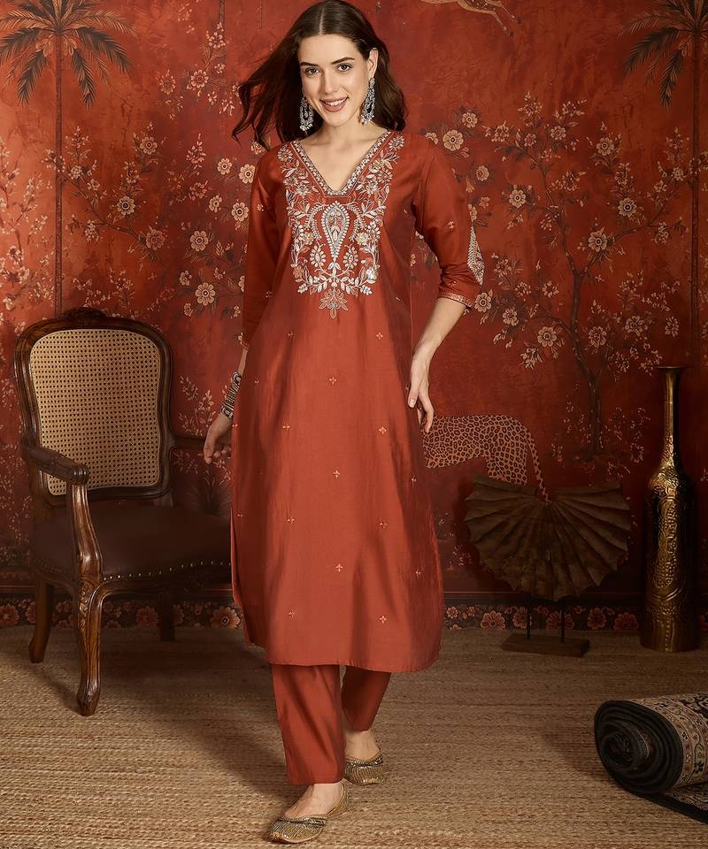 Rust cotton embroidered kurta set.
