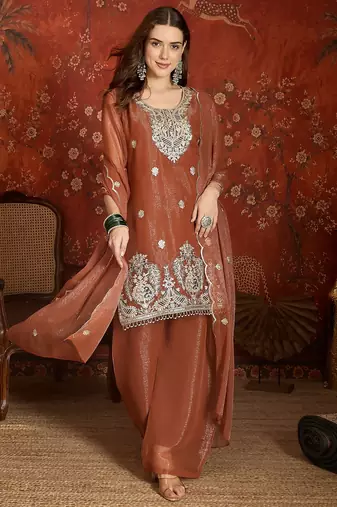 Rust shimmer zari embroidered kurta set.