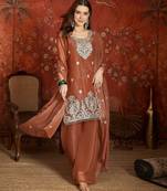 Rust shimmer zari embroidered kurta set.