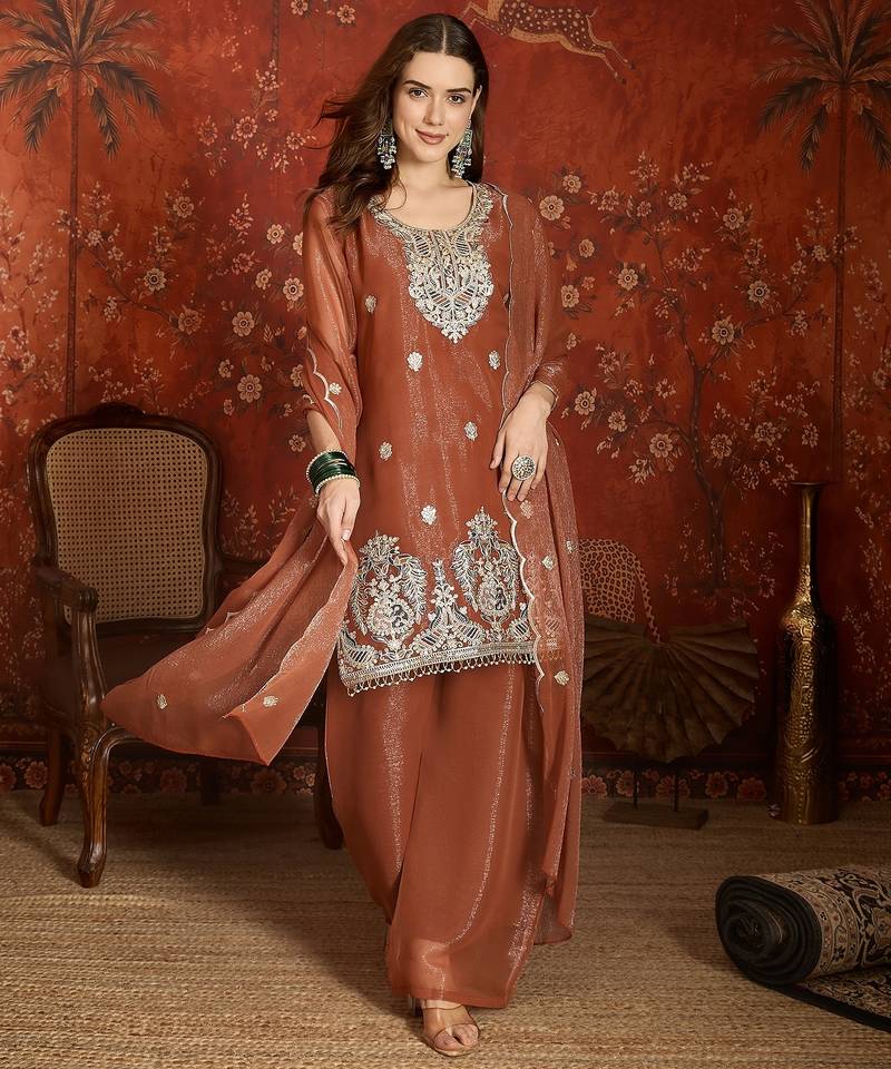 Rust shimmer zari embroidered kurta set.