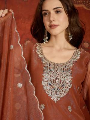 Rust shimmer zari embroidered kurta set. 2