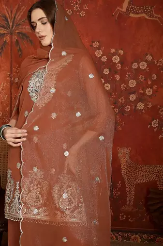 Rust shimmer zari embroidered kurta set.