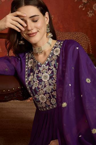 Purple cotton embroidered kurta set.