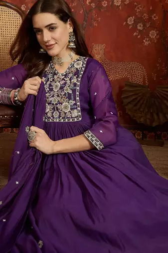 Purple cotton embroidered kurta set.