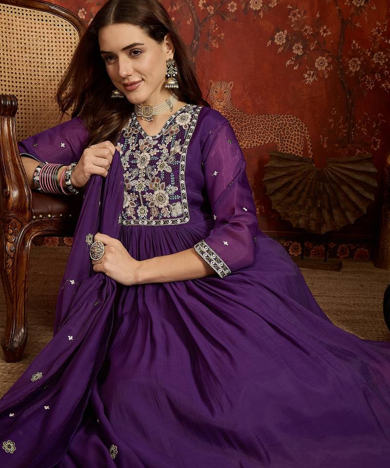 Purple cotton embroidered kurta set.