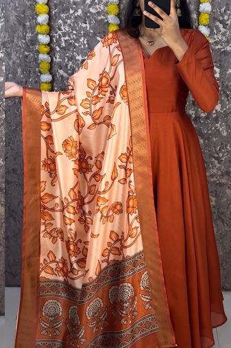 Orange colour solid anarkali suit set with contrast kalamkari floral printed dupatta