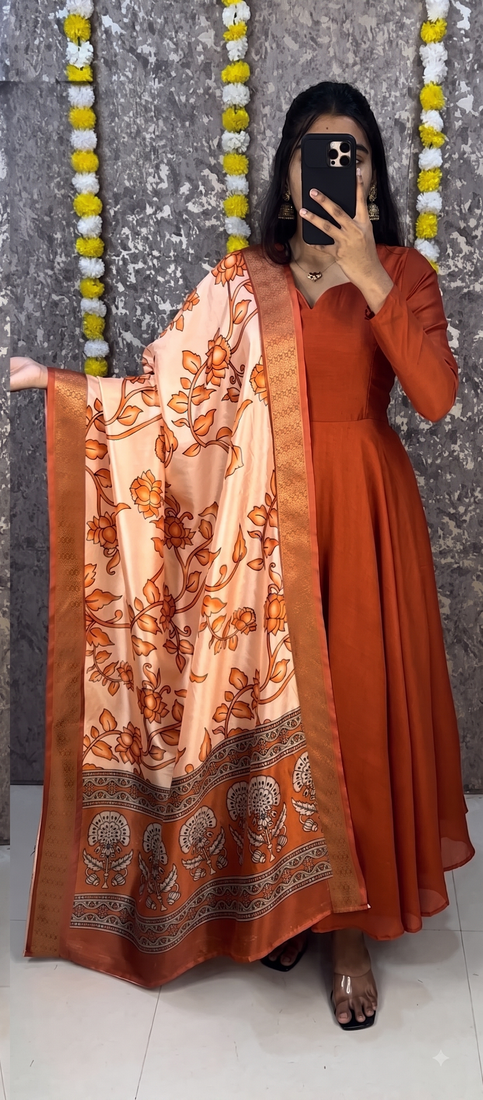 Orange colour solid anarkali suit set with contrast kalamkari floral printed dupatta