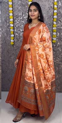 Orange colour solid anarkali suit set with contrast kalamkari floral printed dupatta 3