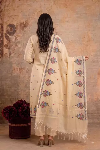 beige kota doria 3pcs unstiched dress material with beautiful floral embroidery work .
