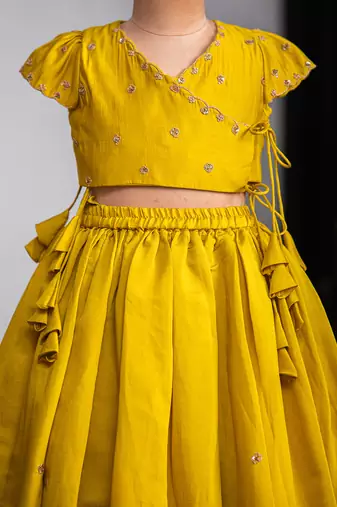 Mustard yellow embroidered muslin silk lehenga set