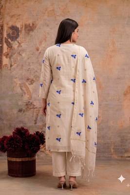 Off-white mul silk BLEND  3pcs Unstitched dress material with blue floral embroidery work . 2