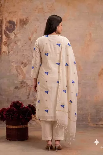 Off-white mul silk BLEND  3pcs Unstitched dress material with blue floral embroidery work .