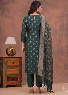 bottle green silk blend 3pcs unstiched dress material with floral booti zari work . 2