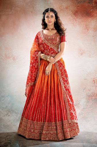 REDISH ORANGE BANDHANI PRINTE WITH SEQUINS ZARI EMROIDERY WORK CHINON LEHENGA CHOLI DUPATTA