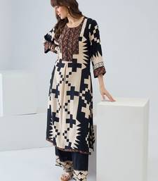 Women Printed Regular Thread Work Kurta with Palazzos