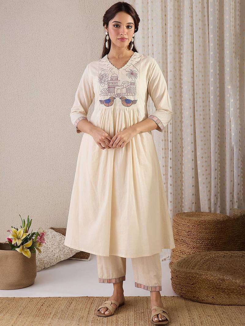 Women Quirky Embroidered Kurta with Trousers