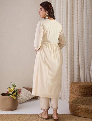 Women Quirky Embroidered Kurta with Trousers 4