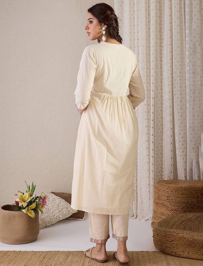 Women Quirky Embroidered Kurta with Trousers