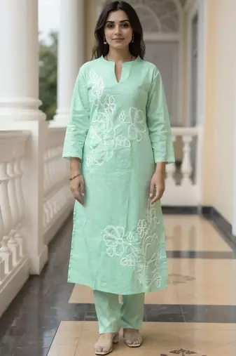 Women Floral Embroidered Cotton Kurta with Trousers
