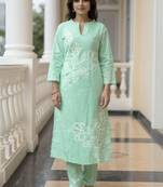 Women Floral Embroidered Cotton Kurta with Trousers