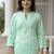 Women Floral Embroidered Cotton Kurta with Trousers