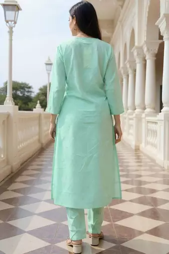 Women Floral Embroidered Cotton Kurta with Trousers