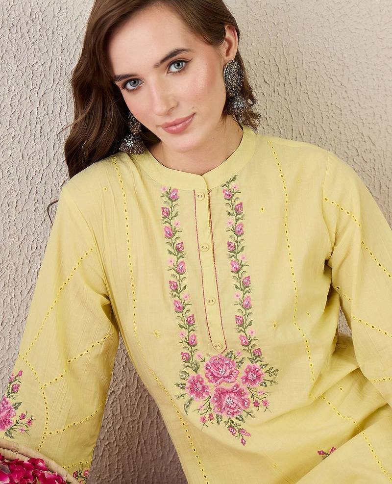 Women Floral Embroidered Cotton Kurta with Trousers