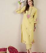 Women Floral Embroidered Cotton Kurta with Trousers