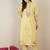 Women Floral Embroidered Cotton Kurta with Trousers